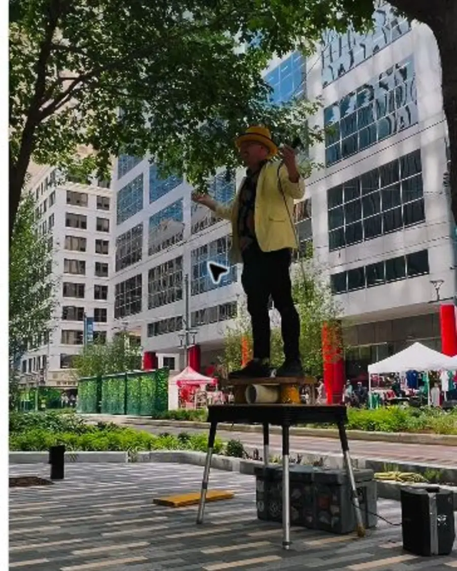Performer at the Main Street Promenade grand opening in Downtown Houston